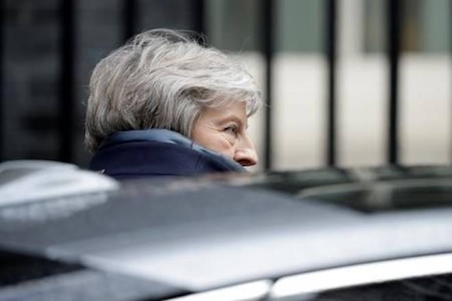 British Prime Minister Theresa May gets in a car as she leaves 10 Downing Street in London, to attend Prime Minister’s Questions at the Houses of Parliament, Wednesday, Nov. 21, 2018. (AP Photo/Matt Dunham)