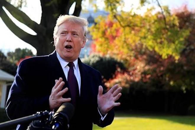 President Donald Trump speaks to the media before leaving the White House in Washington, Tuesday, Nov. 20, 2018, to travel to Florida, where he will spend Thanksgiving at Mar-a-Lago. (AP Photo/Manuel Balce Ceneta)