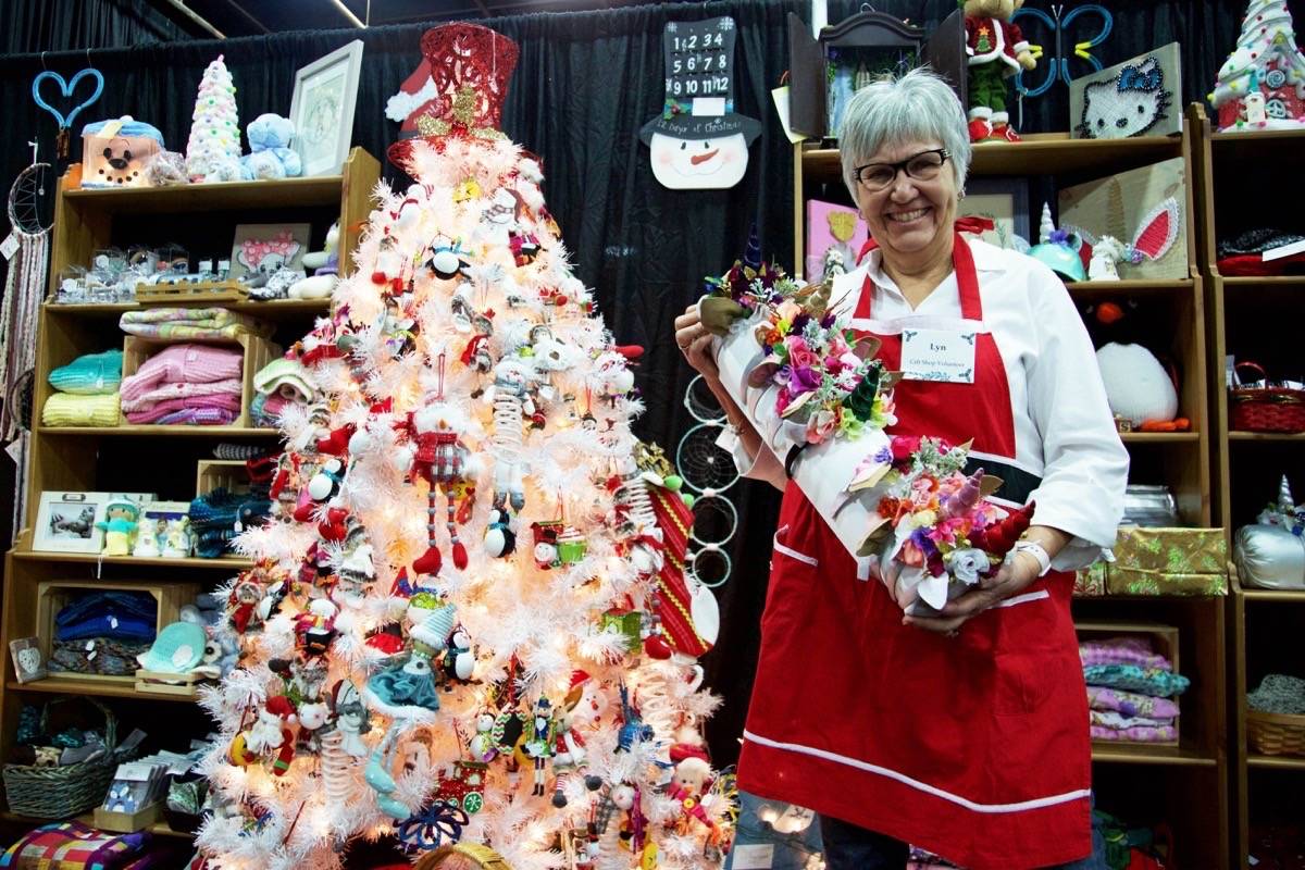 Chair of the 2019 Canada Winter Games Host Society Lyn Radford poses for a photo while volunteering at the Festival of Trees Friday morning. Robin Grant/Red Deer Express