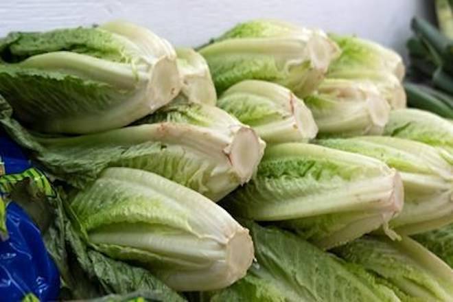 Romaine lettuce is seen at market in Montreal on Thursday, November 22, 2018. Restaurants and grocery stores in Canada have not officially been told to pull their stocks of romaine lettuce, but an ongoing outbreak of E.coli is prompting many to do just that. THE CANADIAN PRESS/Paul Chiasson