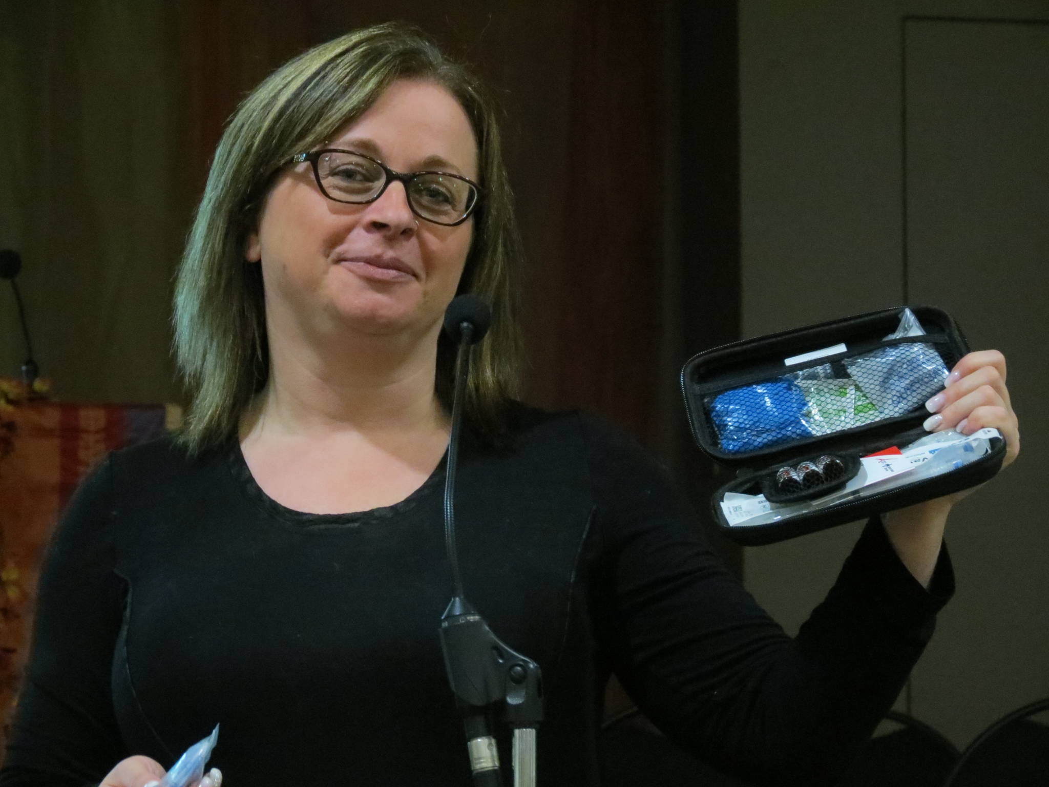 Tricia Peden from Turning Point, a harm reduction agency from Red Deer demonstrates the contents of a Naloxone kit at a presentation in Rimbey recently. Treena Mielke Photo