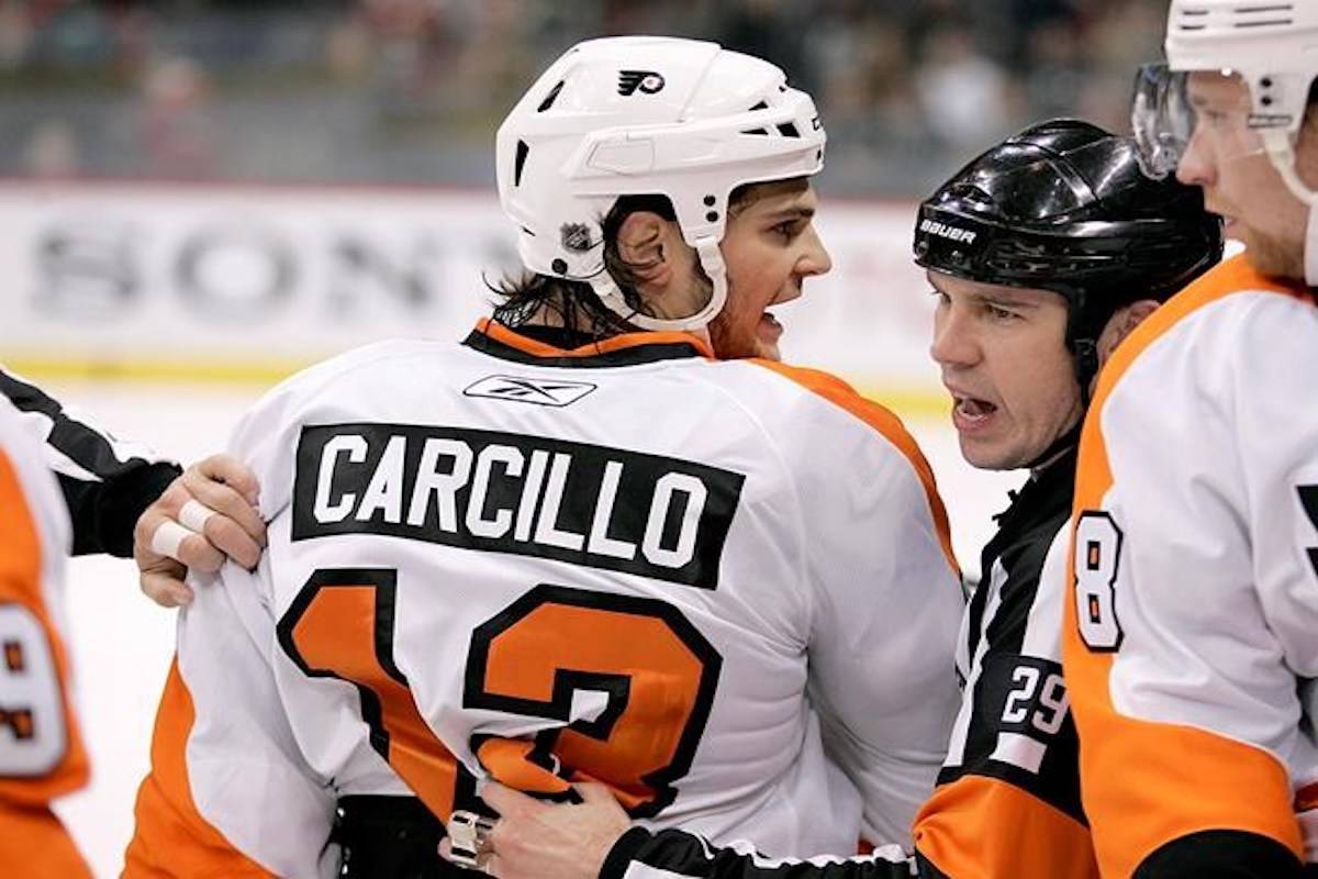 Philadelphia Flyers left wing Daniel Carcillo is restrained by referee Ian Walsh (29) in the first period against the Minnesota Wild during a preseason NHL hockey game in St. Paul, Minn., on September 25, 2010. Daniel Carcillo spoke out on Saturday night about his experience with hazing while a member of the OHL’s Sarnia Sting, detailing how he feels Canada’s hockey culture needs to change. THE CANADIAN PRESS/AP, Andy King