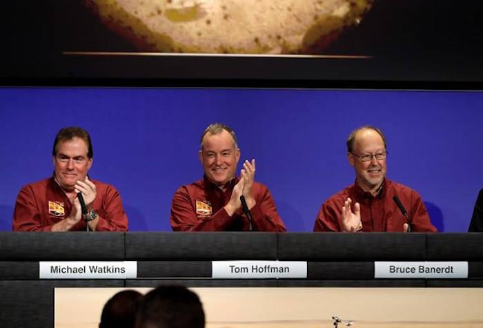 NASA officials, from left, Michael Watkins, Tom Hoffman, and Bruce Banerdt celebrate after the Mars landing of InSight at NASA’s Jet Propulsion Laboratory Monday, Nov. 26, 2018, in Pasadena, Calif. (AP Photo/Marcio Jose Sanchez)