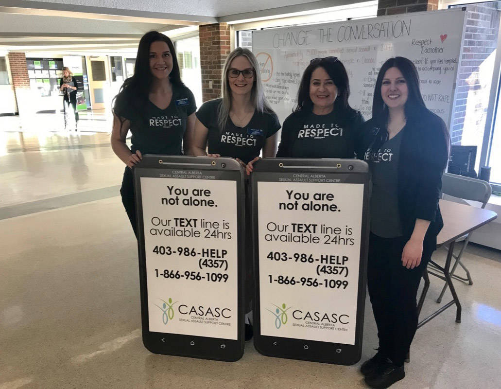 From left, Lauren Nielsen, Holly Hildt, Vanessa Wilson and Patricia Arango all took part running an information booth at Red Deer College on Nov. 29th with the goal of changing the conversation around sexual assault and violence.                                Mark Weber/Red Deer Express
