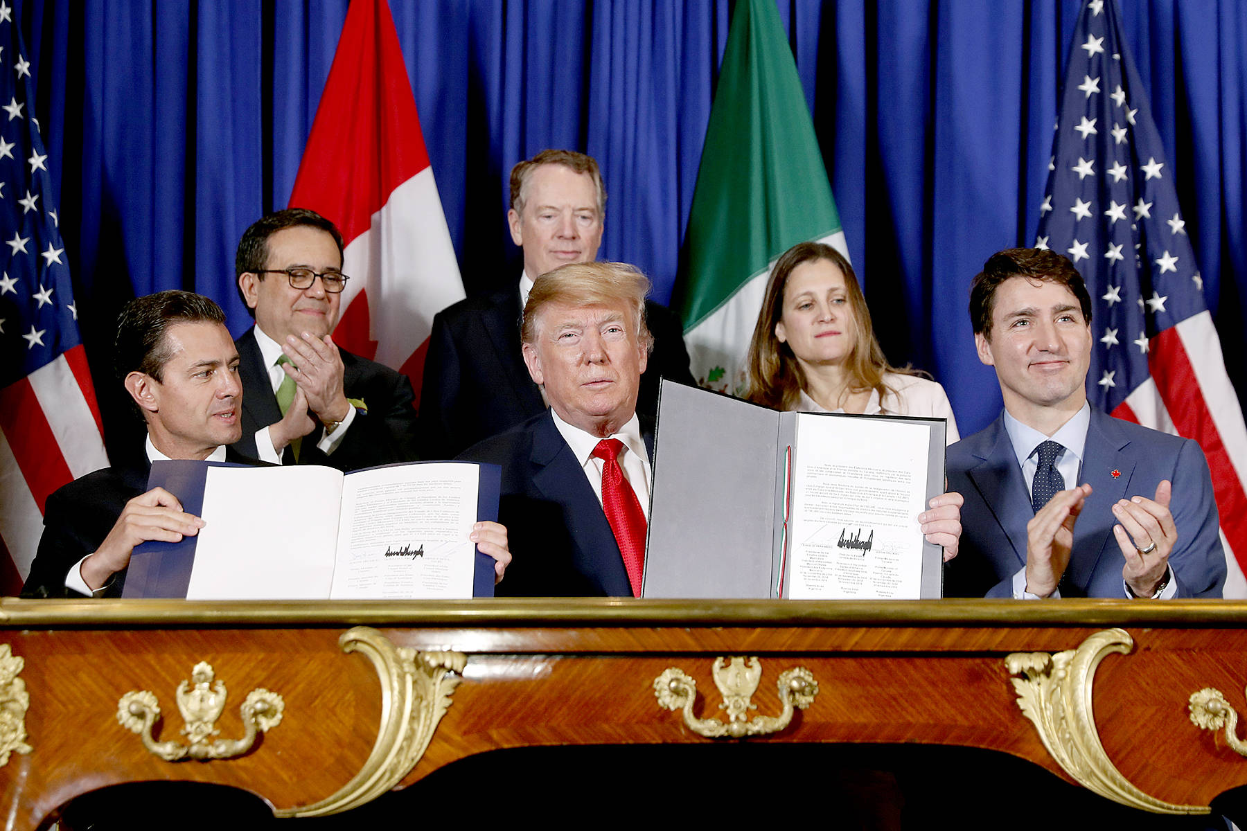 Canada signs onto new NAFTA despite the persistence of steel and aluminum tariffs