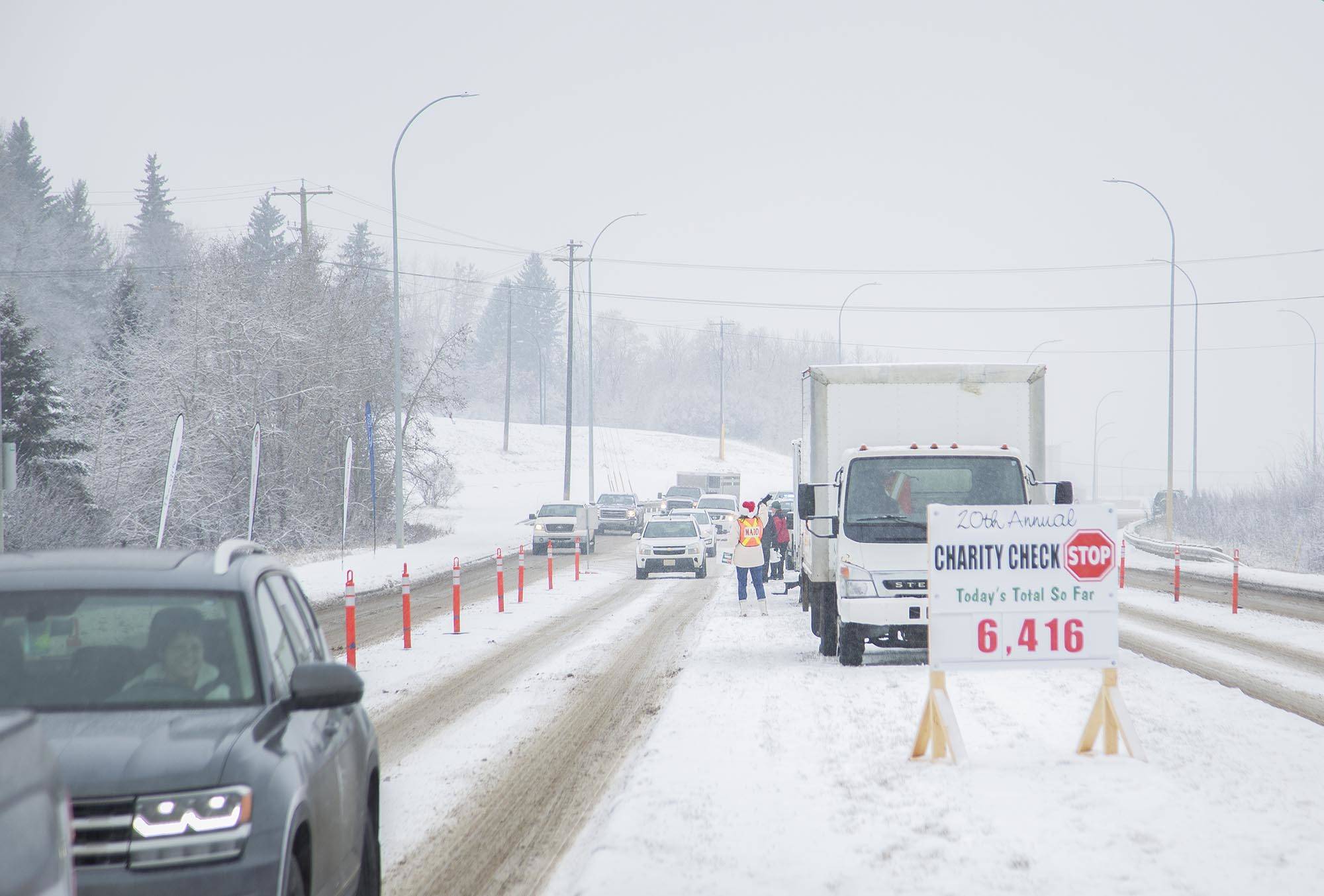 The Red Deer Charity Checkstop runs from 10 a.m. to 4 p.m. on Taylor Drive just North of 32nd St. on Saturday. Donation of money, toys and food are accepted. Robin Grant/Red Deer Express