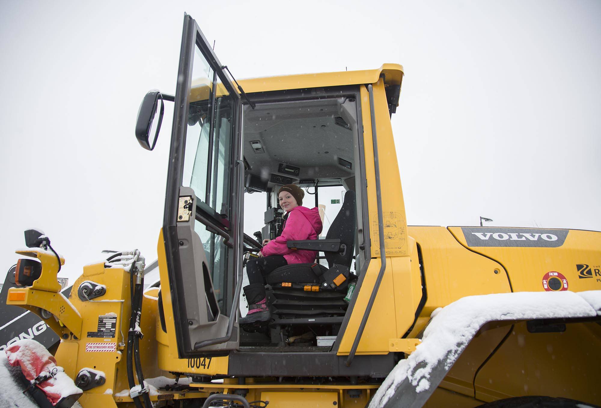 Alexa Rookes, 8, checks out a snow plow at the Snow and Ice Celebration at the Red Deer civic yards Saturday. Robin Grant/Red Deer Express