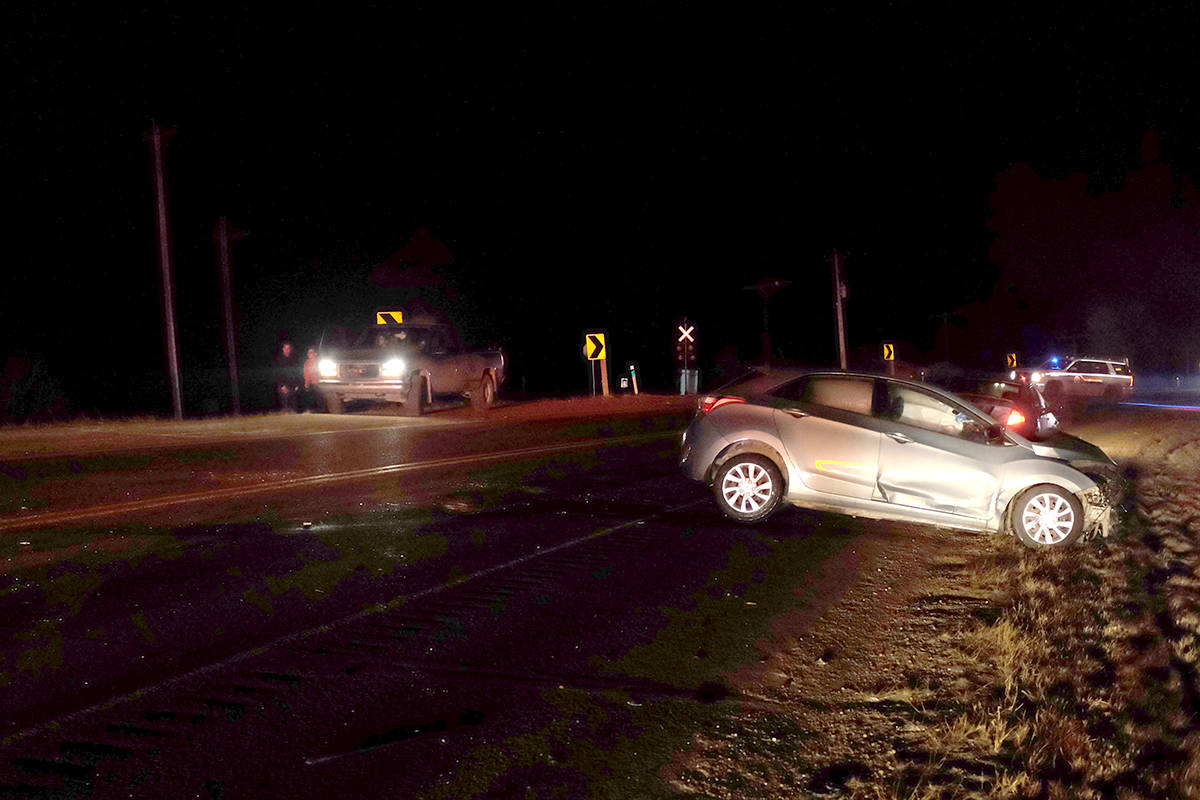 The second vehicle involved in the Friday night collision had relatively minor damage to it, however, its airbags did deploy. The vehicle ended up in the southbound lane of Highway 2A. An RCMP collision analyst was on scene to determine the cause.                                Photo by Jeffrey Heyden-Kaye