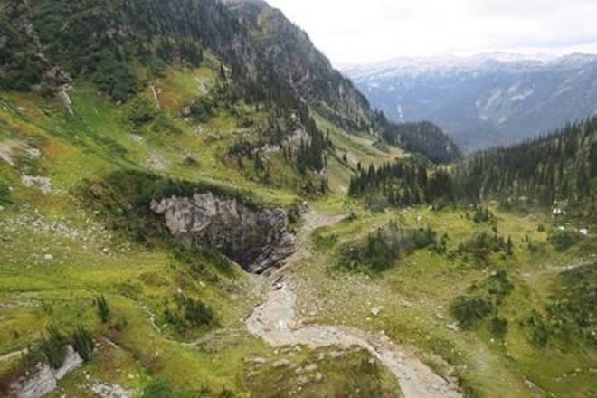 A newly discovered cave in a remote valley in British Columbia’s Wells Gray Provincial Park just might be the country’s largest such feature. The entrance to the cave, nicknamed “Sarlacc’s Pit” by the helicopter crew who discovered it, is seen in an undated handout photo. THE CANADIAN PRESS/HO-Ministry of Environment and Climate Change, Catherine Hickson