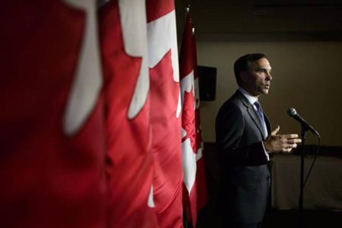 Finance Minister Bill Morneau speaks to reporters in Ottawa on November 22, 2018. (Sean Kilpatrick/The Canadian Press)