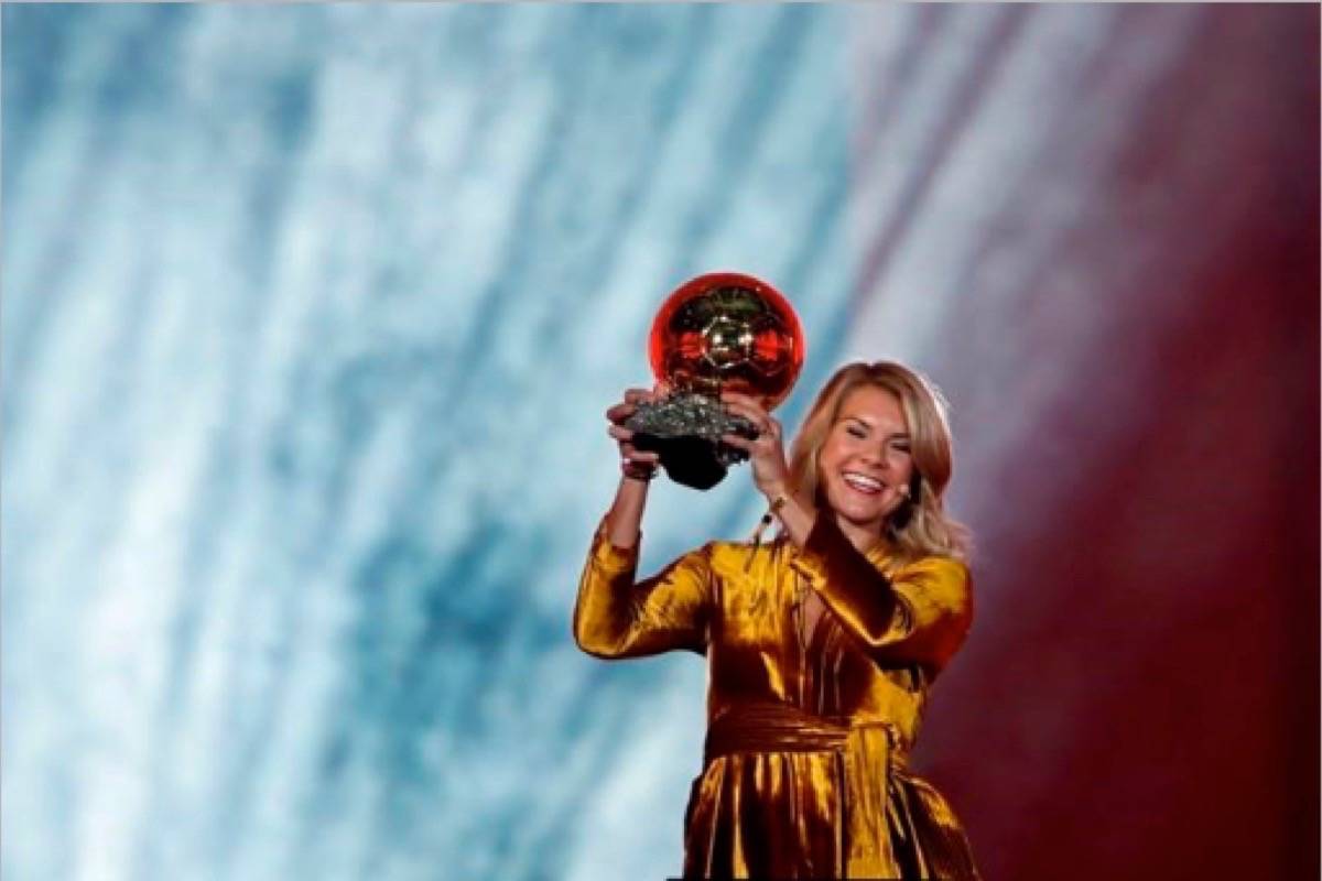 Olympique Lyonnais’ Ada Hegerberg celebrates with the Women’s Ballon d’Or award during the Golden Ball award ceremony at the Grand Palais in Paris, France, Monday, Dec. 3, 2018. Awarded every year by France Football magazine since Stanley Matthews won it in 1956, the Ballon d’Or, Golden Ball for the best player of the year will be given to both a woman and a man. (AP Photo/Christophe Ena)