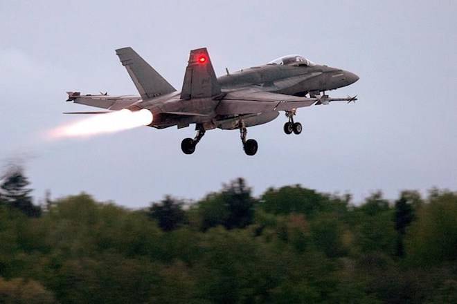 An RCAF CF-18 takes off from CFB Bagotville, Que. on Thursday, June 7, 2018. Defence officials say they expect to know next spring what sensor, weapons and defensive upgrades will be needed to ensure the country’s aging CF-18 fighter jets are still able to fly combat missions until they are replaced in 2032. THE CANADIAN PRESS/Andrew Vaughan