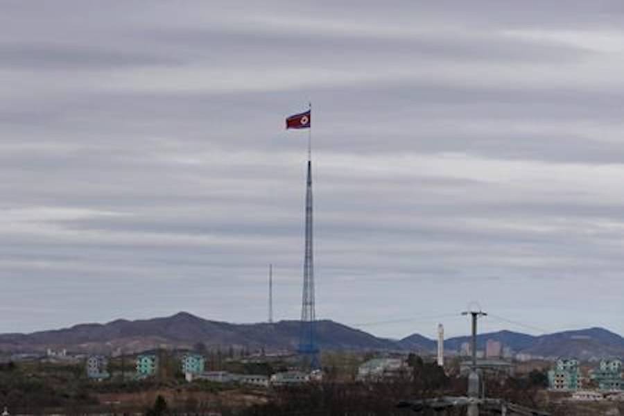 A North Korean flag flutters in the wind atop a 160-meter tower in North Korea’s village Gijungdongseen, as seen from the Taesungdong freedom village inside the demilitarized zone in Paju, South Korea, Tuesday, April 24, 2018. THE CANADIAN PRESS/AP, Lee Jin-man
