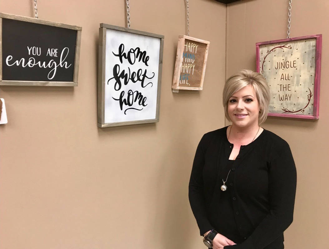 Jessa Pellerin stands beside some of her artistic creations currently on display at The Hub. Her exhibit, called ‘Heart & Key’, runs through to the end of December.                                Mark Weber/Red Deer Express
