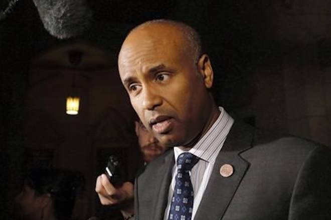 Minister of Immigration, Refugees and Citizenship Ahmed Hussen speaks to reporters outside the House of Commons on Parliament Hill on Thursday, May 31, 2018. Hussen says Canada is committed to signing onto the United Nations pact on migration ??? an international agreement that has sparked angry protest from right-wing political operatives both here and abroad who, experts say, are spreading misinformation and xenophobia.THE CANADIAN PRESS/ Patrick Doyle