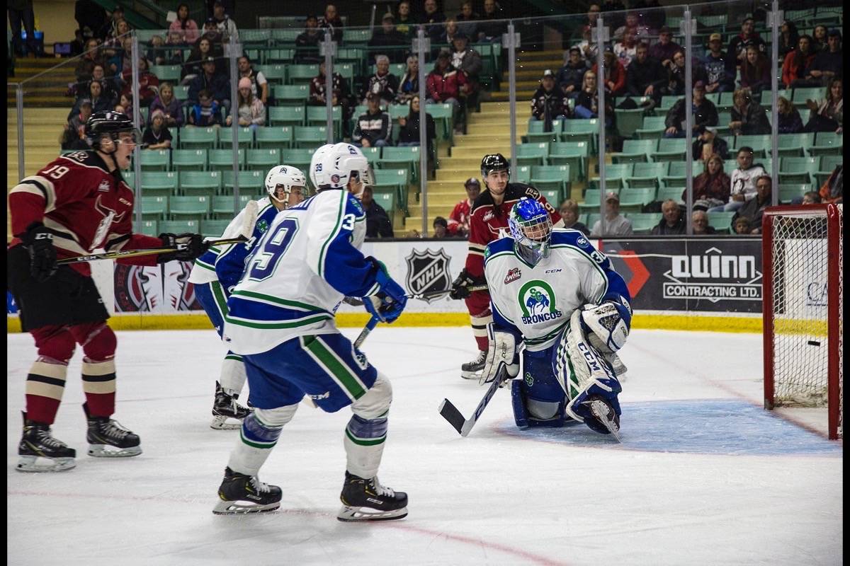 Broncos netminder Joel Hofer watches as the puck from Josh Tarzwell flies by into the net. The Rebels beat the Swift Current Broncos, 6-2, Saturday night at the Centrium. Robin Grant/Red Deer Express