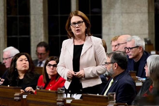 Jane Philpott, Minister of Indigenous Services, stands during question period in the House of Commons on Parliament Hill in Ottawa on Monday, Dec. 10, 2018. THE CANADIAN PRESS/Sean Kilpatrick