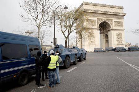 21 detained before Paris protests as police deploy in force