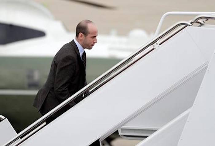 FILE - In this Nov. 2, 2018, file photo, President Donald Trump’s White House Senior Adviser Stephen Miller boards Air Force One for campaign rallies in West Virginia and Indiana, in Andrews Air Force Base, Md. The White House is digging in on its demand for $5 billion to build a border wall as congressional Democrats stand firm against it, pushing the federal government closer to the brink of a partial shutdown. Miller says Trump is prepared to do ‘whatever is necessary’ to build a wall along the U.S.-Mexico border. (AP Photo/Evan Vucci, File)