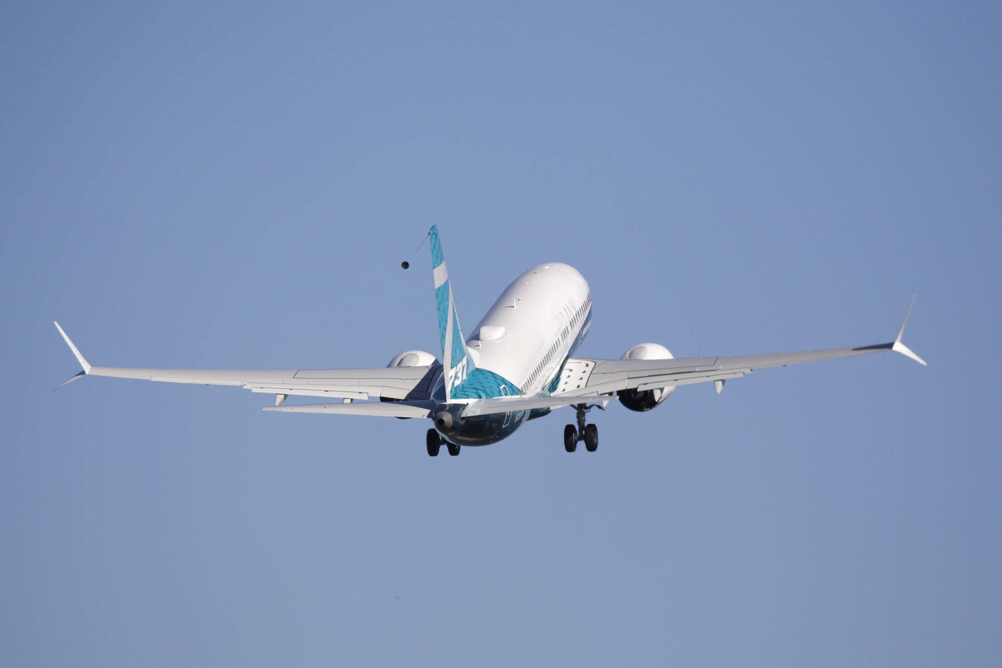 A Boeing 737 MAX 7 takes off on its first flight, Friday, March 16, 2018, in Renton, Wash. (AP Photo/Jason Redmond)