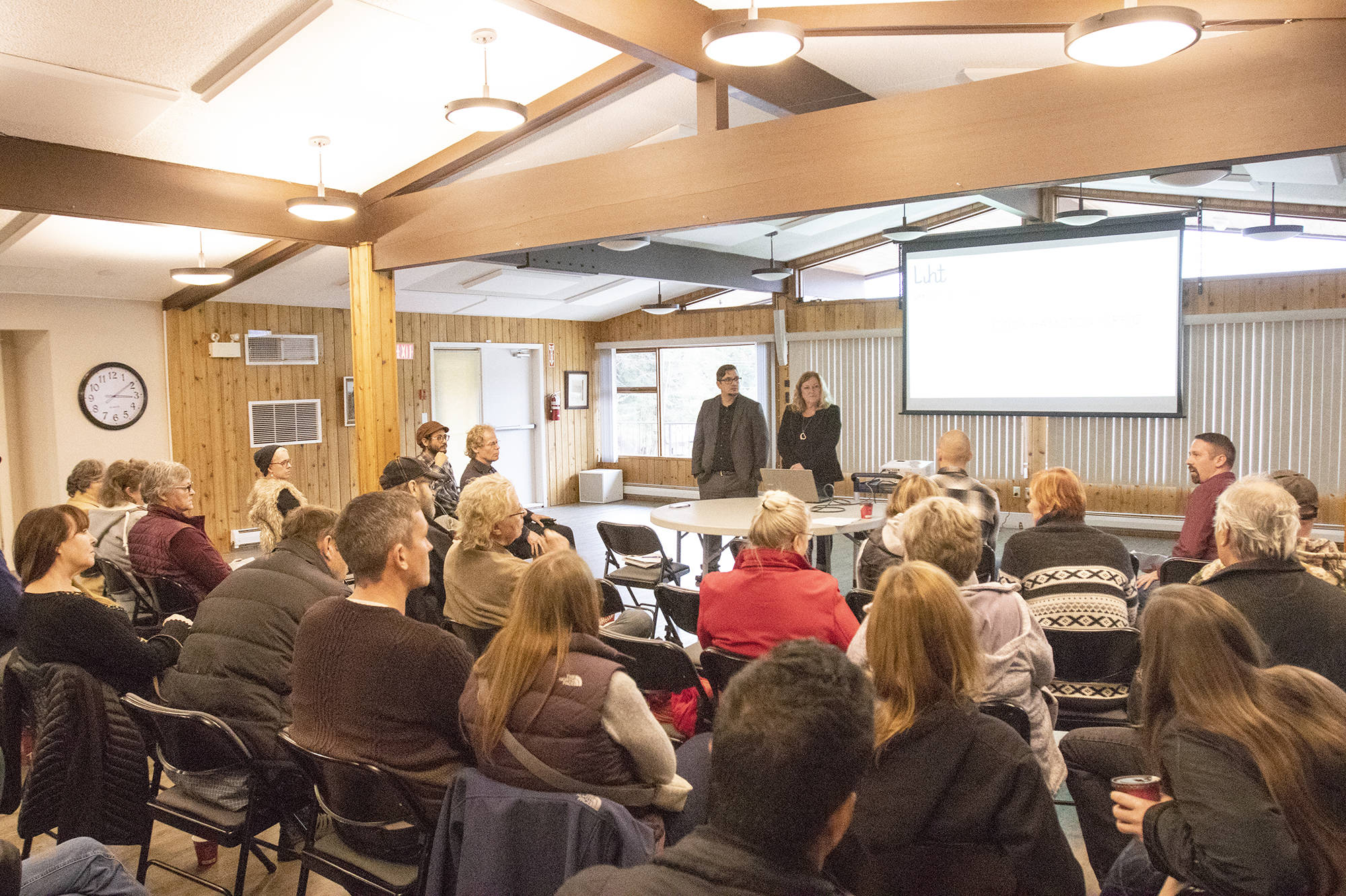 Liht Cannabis Corp’s independent director Richard Huhn and chief operating officer Linda Sampson speak to the crowd gathered during a public information session at the Cedar Heights Community Association in Sorrento, Nov. 17, one of two public meetings held. (Jodi Brak/Salmon Arm Observer)