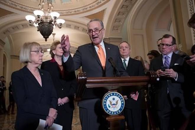Senate Minority Leader Chuck Schumer, D-N.Y., Sen. Patty Murray, D-Wash., Sen. Debbie Stabenow, D-Mich., and Sen. Dick Durbin, D-Ill., the assistant Democratic leader, talks to reporters about the possibility of a partial government shutdown, at the Capitol in Washington, Tuesday, Dec. 18, 2018. (AP Photo/J. Scott Applewhite)