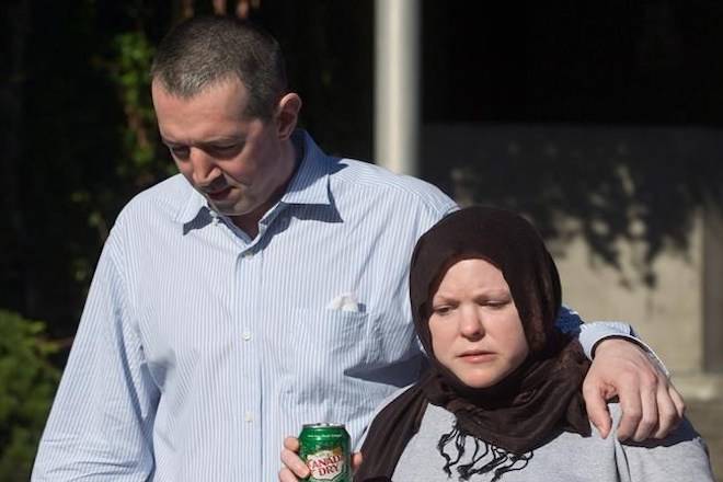 John Nuttall, left, and Amanda Korody, leave jail after a judge ruled the couple were entrapped by the RCMP in a police-manufactured crime, in Vancouver, B.C., on Friday July 29, 2016. THE CANADIAN PRESS/Darryl Dyck