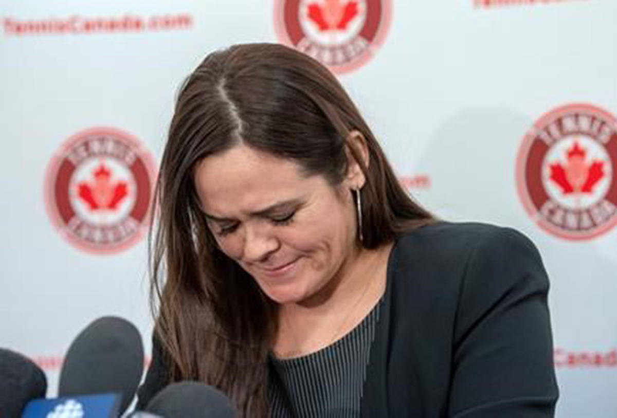 Former Canadian No.1 Aleksandra Wozniak fights back tears as she announces her retirement from professional tennis after a 13 year career at a news conference Wednesday, December 19, 2018 in Montreal. (Ryan Remiorz/The Canadian Press)