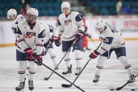 Team USA’s Jack Quinn, left, along with his brother Quinn Hughes, 24, take part in the during pre-game skate at the Sandman Centre in Kamloops, B.C. on Tuesday July 31, 2018. (THE CANADIAN PRESS/Jeff Bassett)