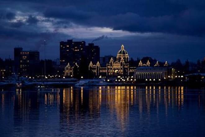 The British Columbia Legislature is reflected in the waters of Victoria harbour in the early morning in Victoria, B.C. Monday, Jan. 16, 2012. THE CANADIAN PRESS/Jonathan Hayward