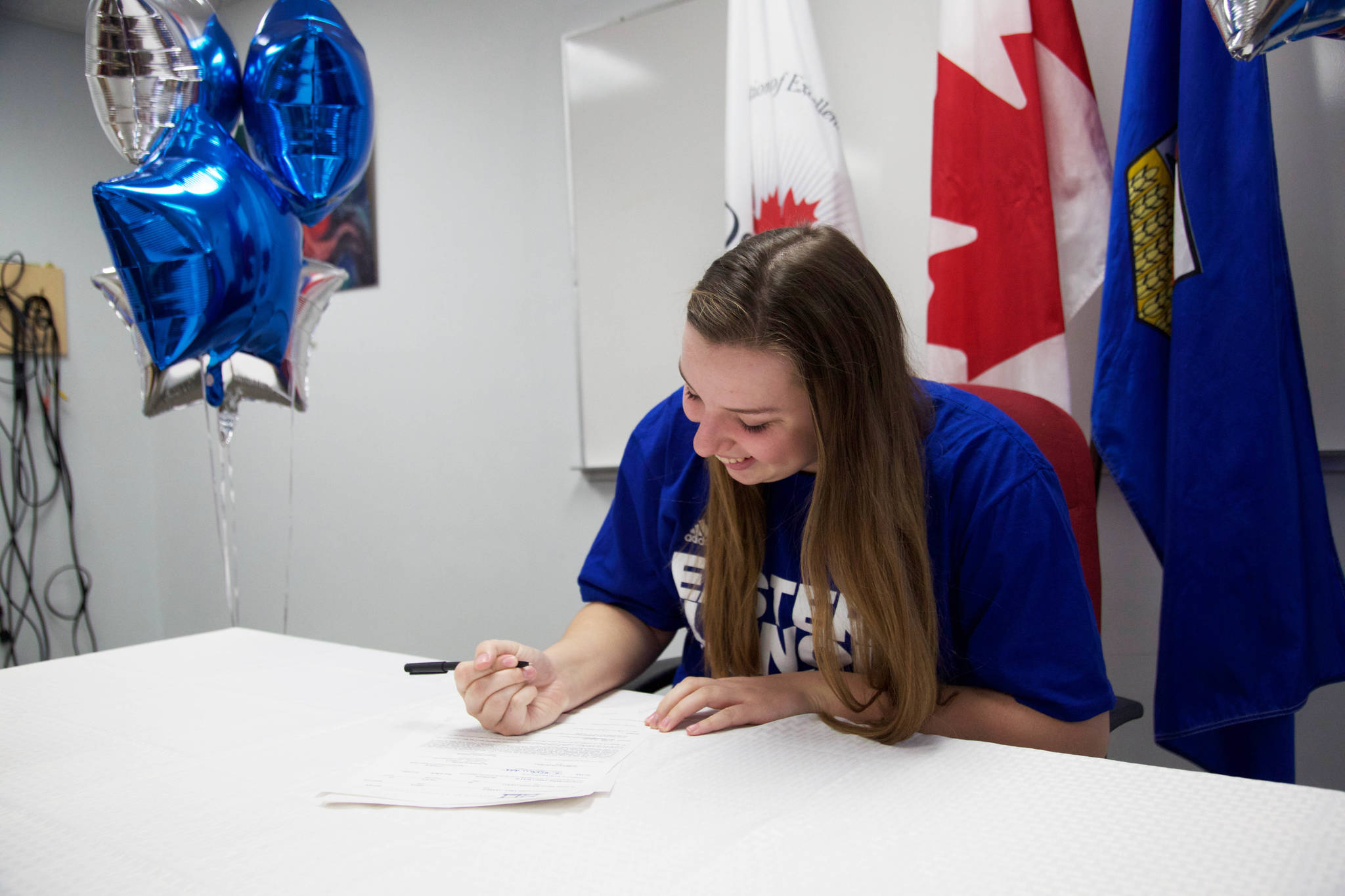 Grade 12 student at Lindsay Thurber High School Joelle Laforce signed a four-year contract to play volleyball with the Eastern Illinois University Panthers next year. She will be attending the university on a scholarship. Robin Grant/Red Deer Express