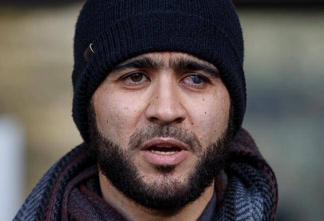 Omar Khadr speaks outside court in Edmonton on Thursday, December 13, 2018. (THE CANADIAN PRESS/Jason Franson)