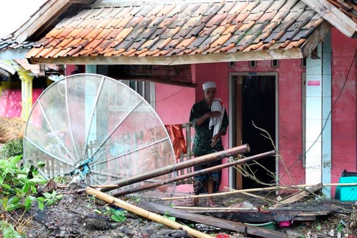 A resident inspects his house damaged by a tsunami, in Sumur village, Indonesia, Monday, Dec. 24, 2018. The tsunami apparently caused by the eruption of an island volcano killed a number of people around Indonesia’s Sunda Strait, sending a wall of water crashing some 65 feet (20 meters) inland and sweeping away hundreds of houses including hotels, the government and witnesses said. (AP Photo/Tatan Syuflana)