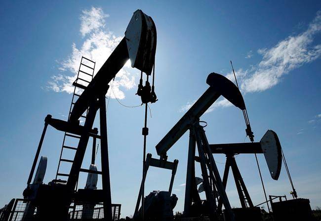 Pumpjacks are shown pumping crude oil near Halkirk, Alta., on June 20, 2007. (THE CANADIAN PRESS/Larry MacDougal)