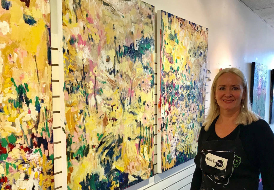Red Deer artist Jeri Lynn Ing poses by one of her vibrant, colourful works in her City studio.                                Mark Weber/Red Deer Express