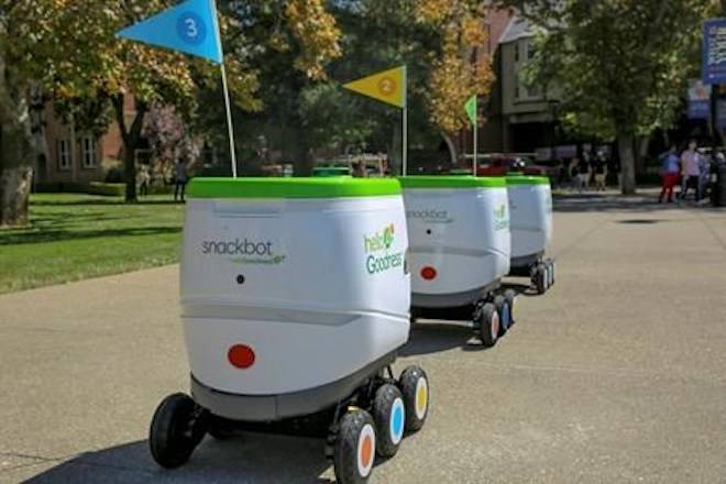 This undated photo provided by PepsiCo shows self-driving robots made by Robby Technologies. PepsiCo says it will start making snack deliveries with the robots on Thursday, Jan. 3, 2019, at the University of the Pacific in Stockton, Calif. Students will be able to order Baked Lay’s, SunChips or Bubly sparkling water on an app, and then meet the six-wheeled robot at more than 50 locations on campus. (PepsiCo via AP)