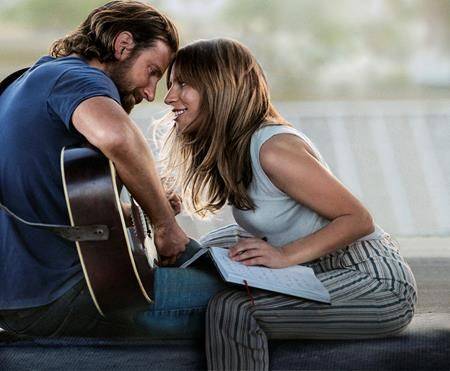 Bradley Cooper, left, and Lady Gaga in a scene from “A Star is Born.” (Warner Bros. Pictures via AP)