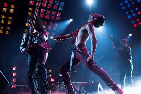 Gwilym Lee, from left, Rami Malek and Joe Mazzello in a scene from “Bohemian Rhapsody.” (Alex Bailey/Twentieth Century Fox via AP)