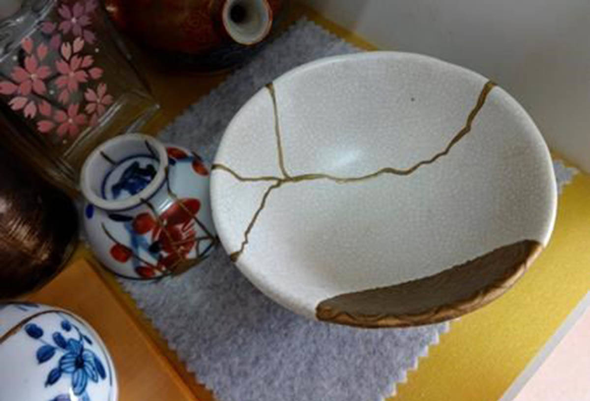 This Nov. 11, 2018 photo shows an example of Kintsugi at the Kuge Crafts workshop in Tokyo. Kintsugi is an ancient Japanese method of repairing broken pottery with gold that creates a new work of art. (Linda Lombardi via AP)