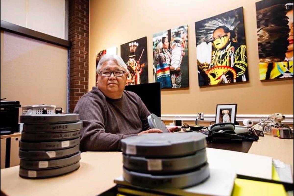 Photographer Bert Crowfoot pictured with rolls of film in Edmonton Alta, on Saturday January 5, 2019. Crowfoot bought boxes of old audiotape and film for a dollar and has safeguarded them for decades and it’s turning out to be a priceless trove of Indigenous story, culture and language. (Jason Franson/The Canadian Press)