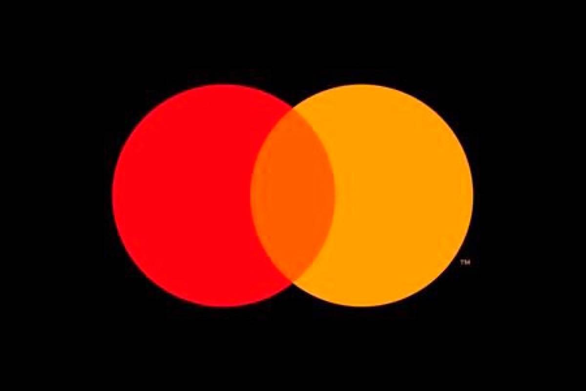This undated product image provided by Mastercard shows Mastercard’s new logo. The digital payment company says it is dropping its name in some contexts, opting to let its familiar interlocking yellow and red circles represent the company at retail locations and online. (Mastercard via AP)