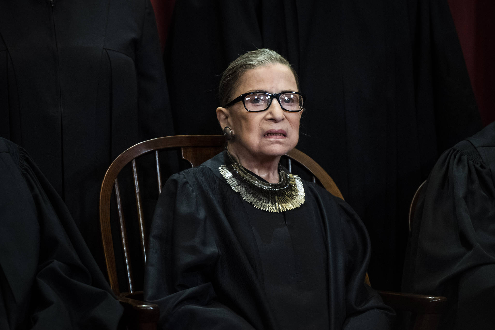 Associate Justice Ruth Bader Ginsburg poses with other Justices of the United States Supreme Court during their official group photo at the Supreme Court on Nov. 30, 2018 in Washington. (Jabin Botsford/Washington Post)