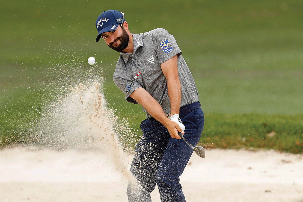 Adam Hadwin chips onto the first green during the final round of the Valspar Championship golf tournament on March 12, 2017. Hadwin is currently among the leaders at the Masters in Augusta, Ga. (THE CANADIAN PRESS/AP, Mike Carlson photo)