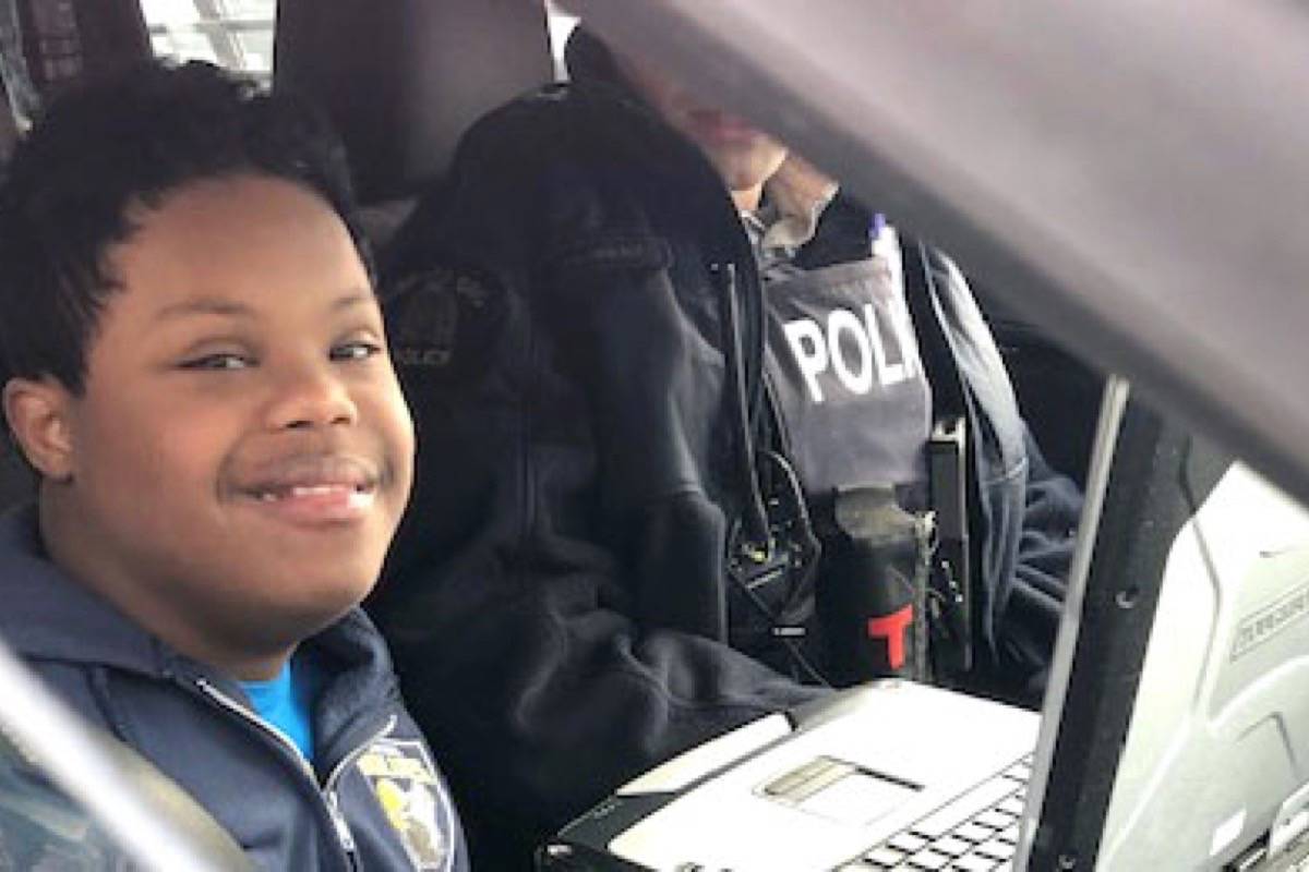 Joshua Stockton had his Christmas wish come true with the help of Airdrie RCMP. (RCMP photo)
