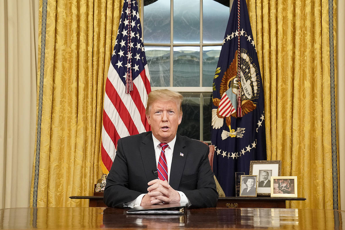 President Donald Trump speaks from the Oval Office of the White House as he gives a prime-time address about border security Tuesday, Jan. 8, 2018, in Washington. (Carlos Barria/Pool Photo via AP)
