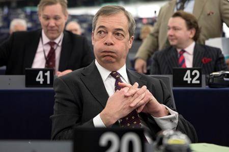 Former U.K. Independence Party leader Nigel Farage listens at the European Parliament during a debate on Brexit, Wednesday, Jan.16, 2019 in Strasbourg, eastern France. (AP Photo/Jean-Francois Badias)
