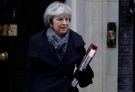 Prime Minister Theresa May leaves 10 Downing Street in London, Wednesday, Jan. 16, 2019. (AP Photo/Kirsty Wigglesworth)