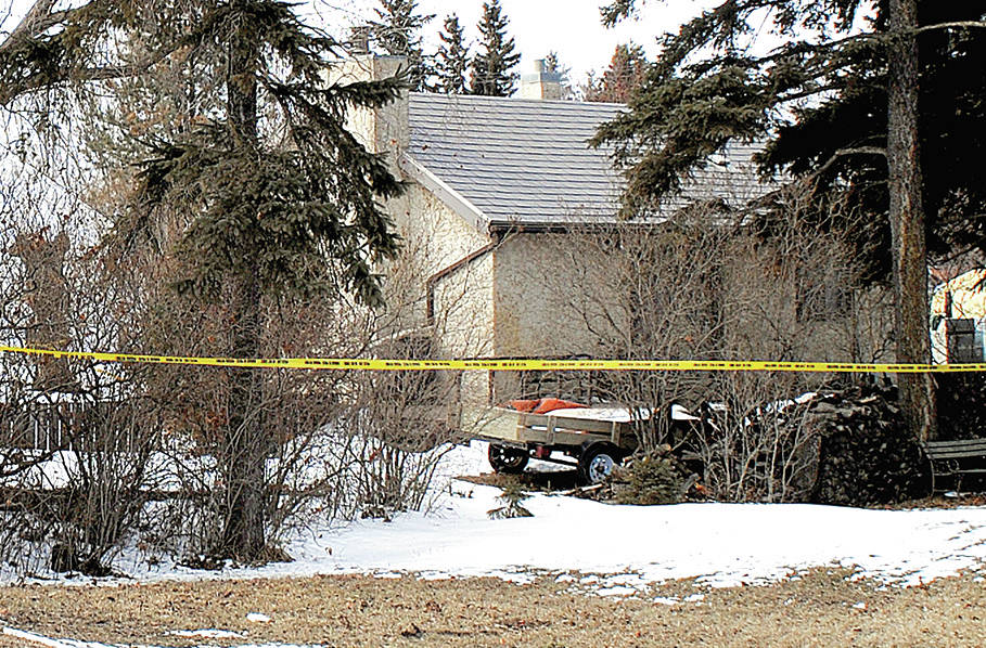 A house is cordoned off in Stettler while Red Deer RCMP investigate a suspicious death. (Lisa Joy/Stettler Independent)