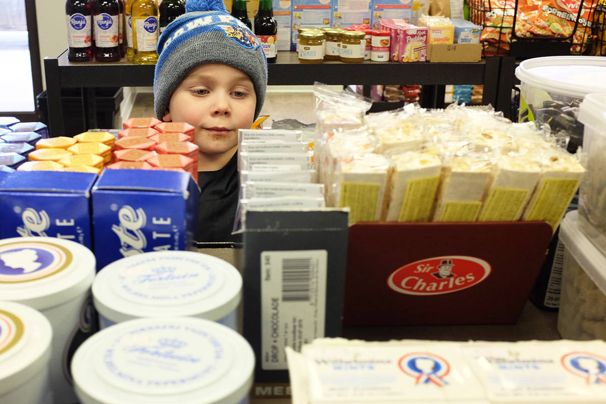 Young Roman Bangma checks out the many different foods and treats available at Makkinga Market, which held its soft opening on Wednesday. Photo by Jeffrey Heyden-Kaye