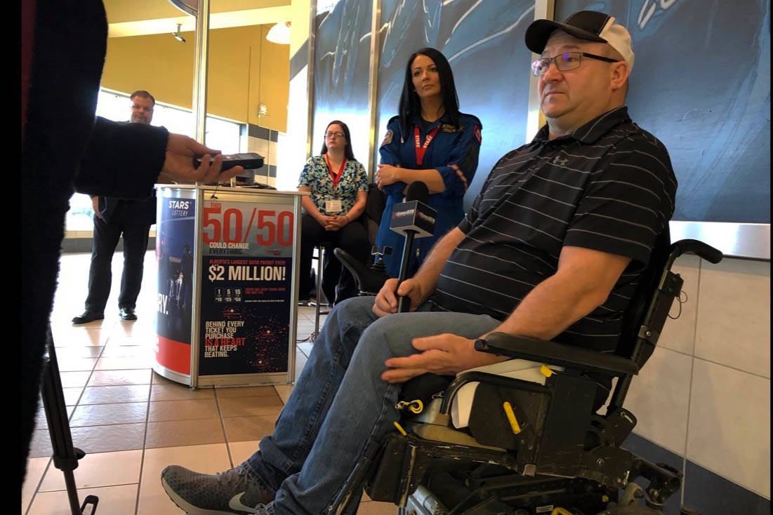 Jason Lunn, who survived a serious car accident with the help of STARS, talks about the importance of the air ambulance service at the launch of the STARS annual lottery in Alberta at Parkland Mall. Robin Grant/Red Deer Express